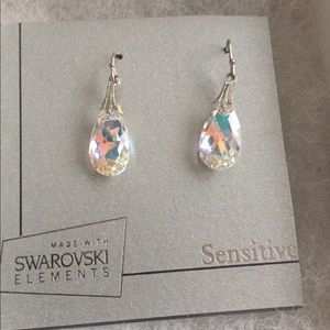 Swarovski earrings. Me wearing yellow green top.